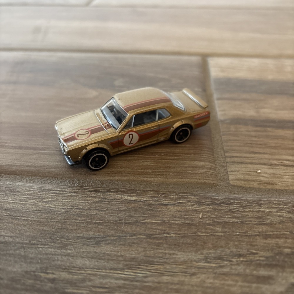 Hot Wheels 2011 Nissan Skyline Car T9703 Gold #2 Indonesia Base 1:64 Diecast